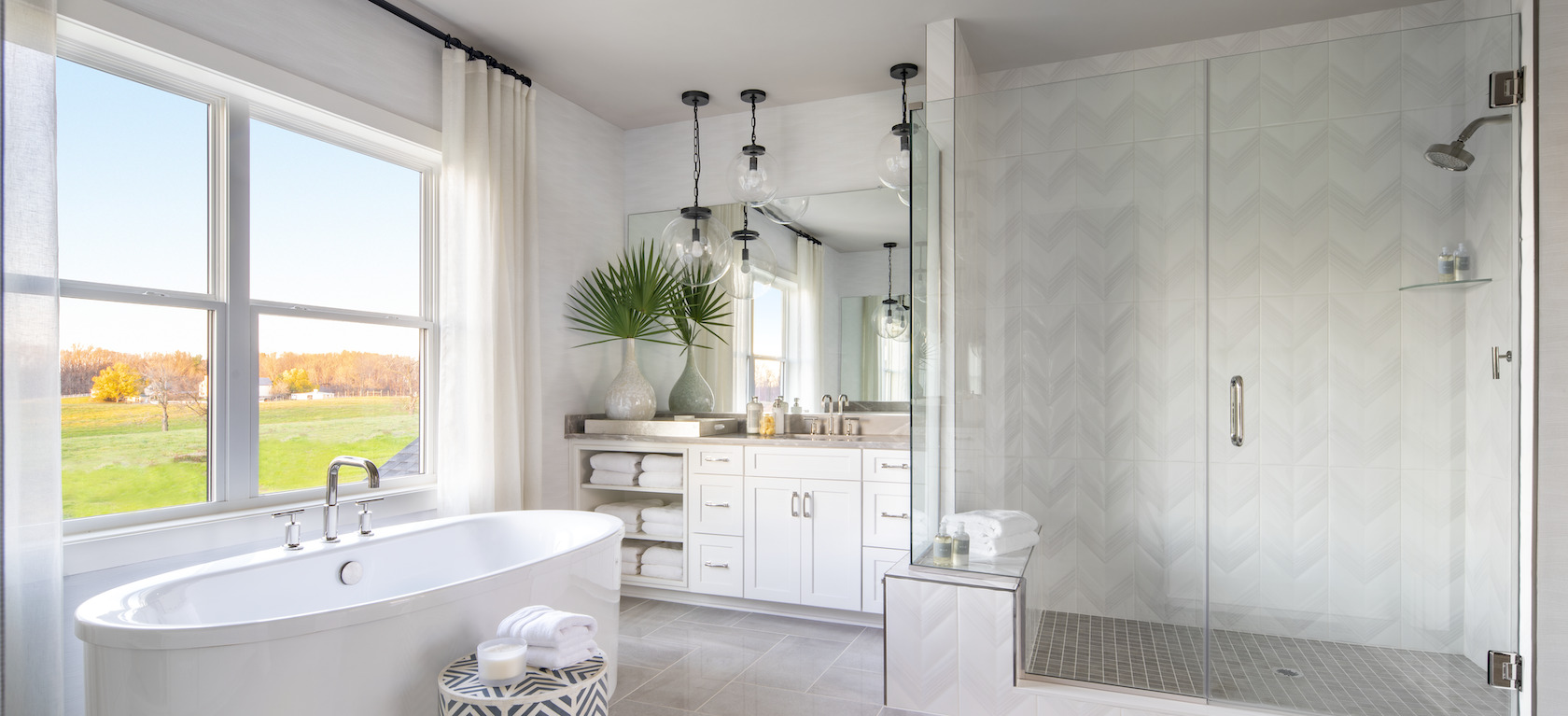 Luxury modern bathroom with walk-in shower after remodeling