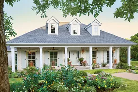 Renovated house exterior with landscaping and curb appeal