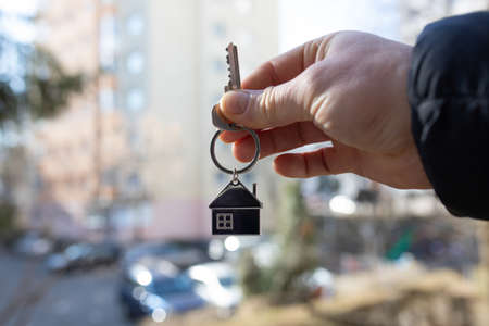 House keys handover representing home loan and warranty support