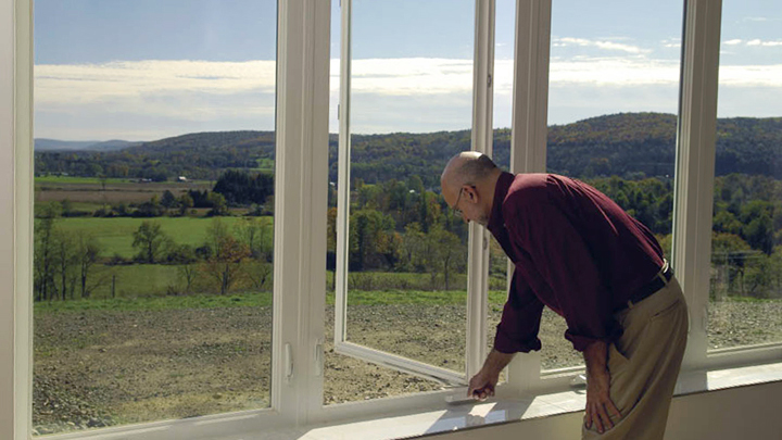 New energy-efficient windows being installed in a home